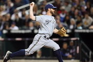 NEW YORK - APRIL 17:  Dave Bush #31 of the Milwaukee Brewers deals a pitch against the New York Mets on April 17, 2009 at Citi Field in the Flushing neighborhood of the Queens borough of New York City.  (Photo by Jim McIsaac/Getty Images)