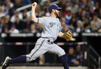 NEW YORK - APRIL 17:  Dave Bush #31 of the Milwaukee Brewers deals a pitch against the New York Mets on April 17, 2009 at Citi Field in the Flushing neighborhood of the Queens borough of New York City.  (Photo by Jim McIsaac/Getty Images)
