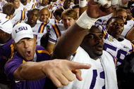 BATON ROUGE, LA - SEPTEMBER 08: Head Coach Les Miles and Glenn Dorsey #72 of Louisiana State University celebrate after their 48-7 victory over Virginia Tech on September 8, 2007 at Tiger Stadium in Baton Rouge, Louisiana. (Photo by Chris Graythen/Getty Images)