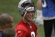 ALLEN PARK, MI - MAY 01:  Matt Stafford #9 of the Detroit Lions talks with teammates during rookie orientation camp at the Detroit Lions Headquarters and Training Facility on May 1, 2009 in Allen Park, Michigan.  (Photo by Gregory Shamus/Getty Images)
