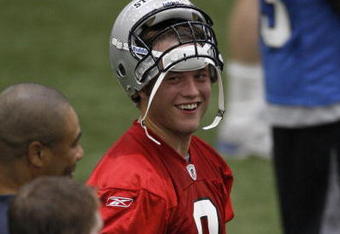 ALLEN PARK, MI - MAY 01:  Matt Stafford #9 of the Detroit Lions talks with teammates during rookie orientation camp at the Detroit Lions Headquarters and Training Facility on May 1, 2009 in Allen Park, Michigan.  (Photo by Gregory Shamus/Getty Images)