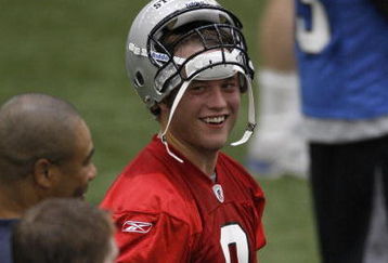 ALLEN PARK, MI - MAY 01:  Matt Stafford #9 of the Detroit Lions talks with teammates during rookie orientation camp at the Detroit Lions Headquarters and Training Facility on May 1, 2009 in Allen Park, Michigan.  (Photo by Gregory Shamus/Getty Images)