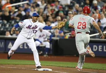 NEW YORK - JUNE 10:  Fernando Tatis #17 of the New York Mets makes the out against Raul Ibanez #29 of the Philadelphia Phillies during their game on June 10, 2009 at Citi Field in the Flushing neighborhood of the Queens borough of New York City.  (Photo by Al Bello/Getty Images)