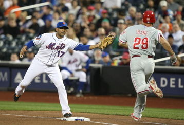NEW YORK - JUNE 10:  Fernando Tatis #17 of the New York Mets makes the out against Raul Ibanez #29 of the Philadelphia Phillies during their game on June 10, 2009 at Citi Field in the Flushing neighborhood of the Queens borough of New York City.  (Photo by Al Bello/Getty Images)