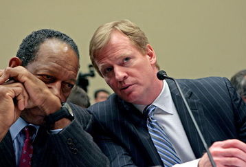 WASHINGTON - FEBRUARY 27: National Football League Players Association Executive Director Gene Upshaw (L) and National Football League Commissioner Roger Goodell talk while testifying before the US House Subcommittee on Commerce, Trade and Consumer Protection about the use of illegal performance-enhancing drugs in professional sports on Captiol Hill February 27, 2008 in Washington, DC. The subcommittee also heard testimony from officials from the US Olympic Committee, Nationa lThoroughbred Racing and the US Anti-Doping Agency.  (Photo by Chip Somodevilla/Getty Images)