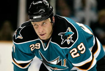 SAN JOSE, CA - APRIL 09:  Ryane Clowe #29 of the San Jose Sharks leans in for a face off during game one of the 2008 NHL conference quarter-final series against the Calgary Flamesat HP Pavilion on April 9, 2008 in San Jose, California.  The Flames defeated the Sharks 3-2 to take 1-0 series lead. (Photo by Christian Petersen/Getty Images)