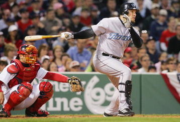 BOSTON - APRIL 13:  Eric Hinske #11 of the Toronto Blue Jays bats against the Boston Red Sox at Fenway Park on April 13, 2006 in Boston, Massachusetts. The Jays defeated the Sox 8-6. (Photo by Jim McIsaac/Getty Images)    