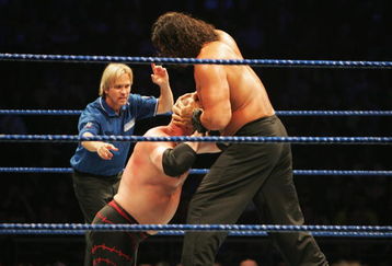 SYDNEY, AUSTRALIA - JUNE 15:  The Great Khali puts ECW Champion Kane into a vice grip during WWE Smackdown at Acer Arena on June 15, 2008 in Sydney, Australia.  (Photo by Gaye Gerard/Getty Images)