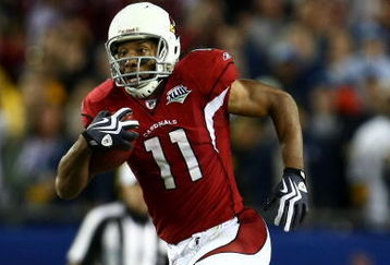 TAMPA, FL - FEBRUARY 01:  Wide receiver Larry Fitzgerald #11 of the Arizona Cardinals scores a 64-yard touchdown reception in the fourth quarter against the Pittsburgh Steelers during Super Bowl XLIII on February 1, 2009 at Raymond James Stadium in Tampa, Florida.  (Photo by Chris McGrath/Getty Images)
