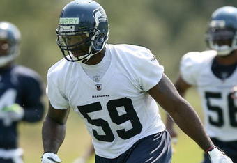 RENTON, WA - JUNE 12:  Linebacker Aaron Curry #59 of the Seattle Seahawks in action during minicamp at the Seahawks training facility on June 12, 2009 in Renton, Washington. (Photo by Otto Greule Jr/Getty Images)