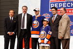 MONTREAL, QC - JUNE 26:  (L-R) Team owner Charles Wang, General Manger Garth Snow, John Tavares, Assistant General Manager/Director of Amateur Scouting Ryan Jankowski and Pro Scout Mario Saraceno of the New Islanders pose on stage after the Islanders drafted Tavares #1 overall during the 2009 NHL Entry Draft by the New York Islander at the Bell Centre on June 26, 2009 in Montreal, Quebec, Canada.  (Photo by Richard Wolowicz/Getty Images)