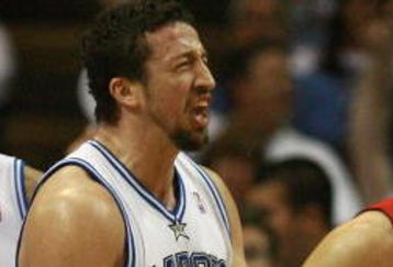 ORLANDO, FL - APRIL 20:  Hedo Turkoglu #15 and Rashard Lewis #9 of the Orlando Magic celebrate after Turkoglu hit a shot and was fouled by Jason Kapono #24 of the Toronto Raptors in Game One of the Eastern Conference Quarterfinals during the 2008 NBA Playoffs at the Amway Arena on April 20, 2008 in Orlando, Florida. NOTE TO USER: User expressly acknowledges and agrees that, by downloading and or using this photograph, User is consenting to the terms and conditions of the Getty Images License Agreement.  (Photo by Doug Benc/Getty Images)