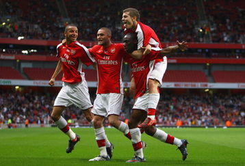 LONDON, ENGLAND - MAY 22:  Gilles Sunu of Arsenal celebrates with team mates after scoring the first goal during the FA Youth Cup Final 1st Leg match between Arsenal and Liverpool at The Emirates Stadium on May 22, 2009 in London, England.  (Photo by Julian Finney/Getty Images)