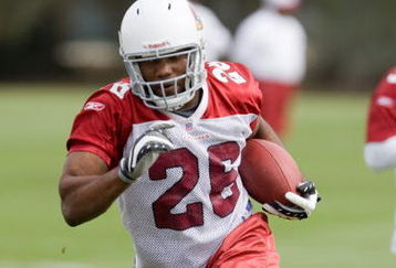 TEMPE, AZ - MAY 1 :  Chris Wells #26 of the Arizona Cardinals runs during a team minicamp at the team training facility on May 1, 2009 in Tempe, Arizona.  (Photo by Jonathan Willey/Getty Images)