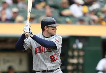 OAKLAND, CA - JUNE 11:  Brendan Harris #23 of the Minnesota Twins bats  against the Oakland Athletics during a Major League Baseball game on June 11, 2009 at the Oakland Coliseum in Oakland, California.  (Photo by Jed Jacobsohn/Getty Images)