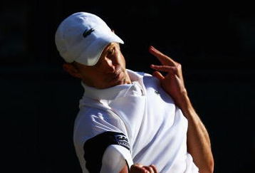 WIMBLEDON, ENGLAND - JULY 03:  Andy Roddick of USA plays a forehand during the men's singles semi final match against Andy Murray of Great Britain on Day Eleven of the Wimbledon Lawn Tennis Championships at the All England Lawn Tennis and Croquet Club on July 3, 2009 in London, England.  (Photo by Julian Finney/Getty Images)