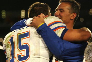 MIAMI - JANUARY 08:  Head coach Urban Meyer and Tim Tebow #15 of the Florida Gators celebrate after their 24-14 win against the Oklahoma Sooners during the FedEx BCS National Championship game at Dolphin Stadium on January 8, 2009 in Miami, Florida.  (Photo by Marc Serota/Getty Images)
