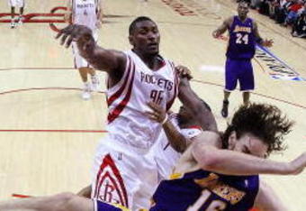 HOUSTON - MAY 08:  Guard Ron Artest #96 of the Houston Rockets commits a flagrant foul on Pau Gasol #16 of the Los Angeles Lakers in Game Three of the Western Conference Semifinals during the 2009 NBA Playoffs at Toyota Center on May 8, 2009 in Houston, Texas. NOTE TO USER: User expressly acknowledges and agrees that, by downloading and or using this photograph, User is consenting to the terms and conditions of the Getty Images License Agreement.  (Photo by Ronald Martinez/Getty Images)