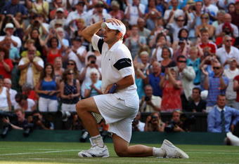 WIMBLEDON, ENGLAND - JULY 03:  Andy Roddick of USA shows his emotions as he celebrates victory during the men's singles semi final match against Andy Murray of Great Britain on Day Eleven of the Wimbledon Lawn Tennis Championships at the All England Lawn Tennis and Croquet Club on July 3, 2009 in London, England.  (Photo by Julian Finney/Getty Images)