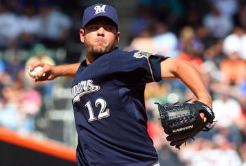 NEW YORK - APRIL 18:  Carlos Villanueva #12 of the Milwaukee Brewers deals a pitch against the New York Mets on April 18, 2009 at Citi Field in the Flushing neighborhood of the Queens borough of New York City.  (Photo by Jim McIsaac/Getty Images)