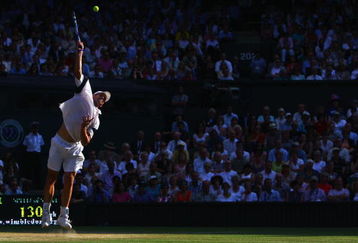 WIMBLEDON, ENGLAND - JULY 03:  Andy Roddick of USA serves during the men's singles semi final match against Andy Murray of Great Britain on Day Eleven of the Wimbledon Lawn Tennis Championships at the All England Lawn Tennis and Croquet Club on July 3, 2009 in London, England.  (Photo by Julian Finney/Getty Images)