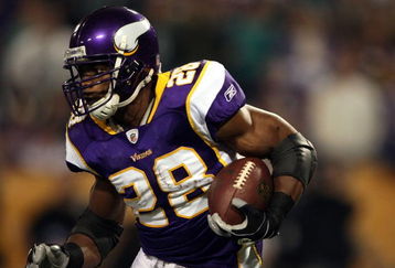 MINNEAPOLIS - JANUARY 4:   Adrian Peterson #28 of the Minnesota Vikings carries the ball in the first half against the Philadelphia Eagles during the NFC Wild Card playoff game on January 4,2009 at the Hubert H. Humphrey Metrodome in Minneapolis, Minnesota. (Photo by Elsa/Getty Images)