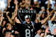 24 Oct 1999: A fan of the Oakland Raiders cheers in the stands as he wears the logo during a game against the New York Jets at the Network Coliseum in Oakland, California. The Raiders defeated the Jets 24-23. Mandatory Credit: Jon Ferrey /Allsport