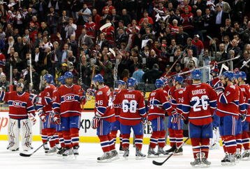 MONTREAL- APRIL 22:  Members of the Montreal Canadiens wave to fans after being defeated 4-1 by the Boston Bruins in Game Four of the Eastern Conference Quarterfinals of the 2009 Stanley Cup Playoffs at the Bell Centre on April 22, 2009 in Montreal, Quebec, Canada.  The Bruins defeated the Canadiens 4-1 winning the series 4-0.  (Photo by Richard Wolowicz/Getty Images)