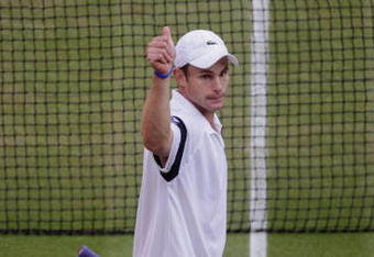 WIMBLEDON, ENGLAND - JULY 03:  Andy Roddick of USA celebrates during the men's singles semi final match against Andy Murray of Great Britain on Day Eleven of the Wimbledon Lawn Tennis Championships at the All England Lawn Tennis and Croquet Club on July 3, 2009 in London, England.  (Photo by Pool/Getty Images)