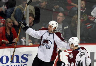 CHICAGO - MARCH 08:  (L-R)  Ryan Smyth #94 and Marek Svatos #40 of the Colorado Avalanche celebrate after Smyth scored a goal in the third period against the Chicago Blackhawks at the United Center on March 8, 2009 in Chicago, Illinois.  (Photo by Jonathan Daniel/Getty Images)