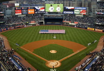 NEW YORK - APRIL 03:  A general view of Yankee Stadium during the playing of the National Anthem before the New York Yankees game against the Chicago Cubs at Yankee Stadium on April 3, 2009 in the Bronx borough of New York City. Today's exhibition game is the first game to played in the new Yankee Stadium.  (Photo by Ezra Shaw/Getty Images)