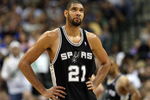 DALLAS - APRIL 25:  Forward Tim Duncan #21 of the San Antonio Spurs during play against the Dallas Mavericks in Game Four of the Western Conference Quarterfinals during the 2009 NBA Playoffs at American Airlines Center on April 25, 2009 in Dallas, Texas. NOTE TO USER: User expressly acknowledges and agrees that, by downloading and or using this photograph, User is consenting to the terms and conditions of the Getty Images License Agreement.  (Photo by Ronald Martinez/Getty Images)