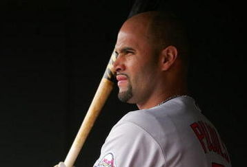 SAN FRANCISCO - MAY 31:  Albert Pujols #5 of the St. Louis Cardinals warms up in the dugout before he bats against the San Francisco Giants at AT&T Park on May 31, 2009 in San Francisco, California.  (Photo by Ezra Shaw/Getty Images)