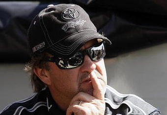 DAYTONA BEACH, FL - FEBRUARY 11:  Mike Skinner, driver of the #5 Exide Toyota, stands in the garage area during practice for the NASCAR Camping World Truck Series NextEra Energy Resources 250 at Daytona International Speedway on February 11, 2009 in Daytona Beach, Florida.  (Photo by Jason Smith/Getty Images for NASCAR)