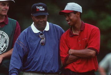 27 Aug 1995:  Tiger Woods shares a smile with his father, Earl, during a round of competition in the 1995 U.S. Amatuer Championships held at the Newport Country Club in Newport, Rhode Island.   Mandatory Credit: J.D. Cuban/Allsport
