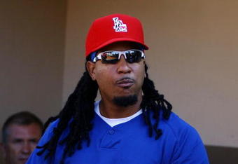 SAN DIEGO - JULY 3:  Manny Ramirez #99 of the Los Angeles Dodgers walks out of the dugout during batting practice before taking on the San Diego Padres on July 3, 2009 at Petco Park in San Diego, California. Ramirez returns to the Dodgers lineup after a 50-game suspension for violating baseball's drug policy. (Photo by Jeff Gross/Getty Images)