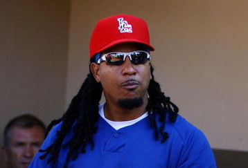 SAN DIEGO - JULY 3:  Manny Ramirez #99 of the Los Angeles Dodgers walks out of the dugout during batting practice before taking on the San Diego Padres on July 3, 2009 at Petco Park in San Diego, California. Ramirez returns to the Dodgers lineup after a 50-game suspension for violating baseball's drug policy. (Photo by Jeff Gross/Getty Images)