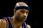CHARLOTTE, NC - OCTOBER 15:  Vince Carter #15 of the New Jersey Nets looks down during the game against the Charlotte Bobcats at Charlotte Bobcats Arena on October 15, 2007 in Charlotte, North Carolina.  The Bobcats won 96-86.  NOTE TO USER: User expressly acknowledges and agrees that, by downloading and/or using this Photograph, user is consenting to the terms and conditions of the Getty Images License Agreement. (Photo by Kevin C. Cox/Getty Images)
