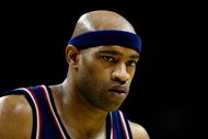 CHARLOTTE, NC - OCTOBER 15: Vince Carter #15 of the New Jersey Nets looks down during the game against the Charlotte Bobcats at Charlotte Bobcats Arena on October 15, 2007 in Charlotte, North Carolina. The Bobcats won 96-86. NOTE TO USER: User expressly acknowledges and agrees that, by downloading and/or using this Photograph, user is consenting to the terms and conditions of the Getty Images License Agreement. (Photo by Kevin C. Cox/Getty Images)