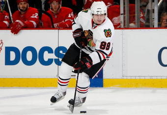DETROIT - MAY 27:  Patrick Kane #88 of the Chicago Blackhawks skates with the puck against the Detroit Red Wings during Game Five of the Western Conference Championship Round of the 2009 Stanley Cup Playoffs on May 27, 2009 at Joe Louis Arena in Detroit, Michigan. The Red WIngs won 2-1 in overtime. (Photo by Gregory Shamus/Getty Images)