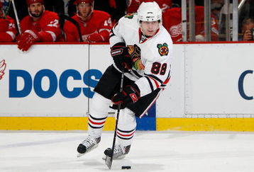 DETROIT - MAY 27:  Patrick Kane #88 of the Chicago Blackhawks skates with the puck against the Detroit Red Wings during Game Five of the Western Conference Championship Round of the 2009 Stanley Cup Playoffs on May 27, 2009 at Joe Louis Arena in Detroit, Michigan. The Red WIngs won 2-1 in overtime. (Photo by Gregory Shamus/Getty Images)
