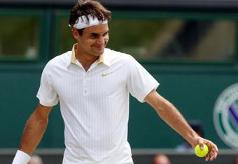 WIMBLEDON, ENGLAND - JULY 03:  Roger Federer of Switzerland smiles during the men's singles semi final match against Tommy Haas of Germany on Day Eleven of the Wimbledon Lawn Tennis Championships at the All England Lawn Tennis and Croquet Club on July 3, 2009 in London, England.  (Photo by Hamish Blair/Getty Images)