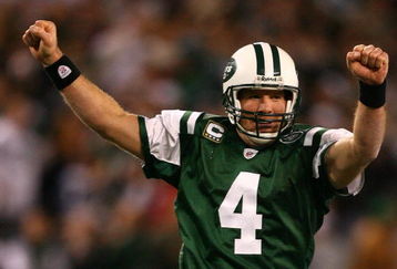 EAST RUTHERFORD, NJ - DECEMBER 28: Brett Favre #4 of The New York Jets celebrates after throwing a touchdown to Laveranues Coles #87 against The Miami Dolphins during their game on December 28, 2008 at Giants Stadium in East Rutherford, New Jersey. (Photo by Al Bello/Getty Images)