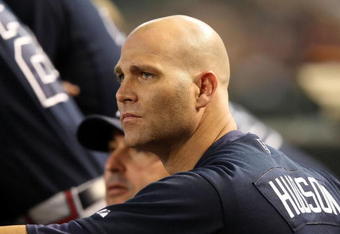 PHOENIX - MAY 30:  Pitcher Tim Hudson #15 of the Atlanta Braves watches from the dugout during the major league baseball game against the Arizona Diamondbacks at Chase Field on May 30, 2009 in Phoenix, Arizona.The Diamondbacks defeated the Braves 3-2.  (Photo by Christian Petersen/Getty Images)