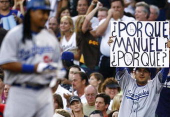 SAN DIEGO - JULY 3:  A fan holds up a sign after Manny Ramirez #99 of the Los Angeles Dodgers grounded out in the second inning against the San Diego Padres during the game on July 3, 2009 at Petco Park in San Diego, California. (Photo by Jeff Gross/Getty Images)