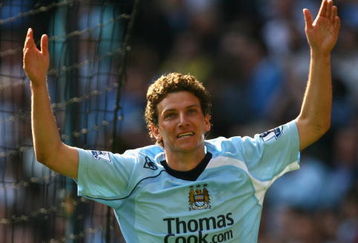 MANCHESTER, ENGLAND - APRIL 19:  Elano of Manchester City celebrates scoring his team's third goal during the Barclays Premier League match between Manchester City and West Bromwich Albion at the City of Manchester Stadium on April 19, 2009 in Manchester, England.  (Photo by Alex Livesey/Getty Images)