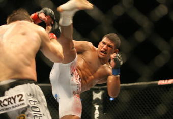 CHICAGO - OCTOBER 25:  Sean Sherk (L)  fights Tyson Griffin in a Lightweight bout at UFC's Ultimate Fight Night at Allstate Arena on October 25, 2008 in Chicago, Illinois. (Photo by Tasos Katopodis/Getty Images)