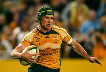 SYDNEY, AUSTRALIA - JUNE 27:  Matt Giteau of the Wallabies crosses the line to score a try during the Test match between the Australian Wallabies and France at ANZ Stadium on June 27, 2009 in Sydney, Australia.  (Photo by Matt King/Getty Images)