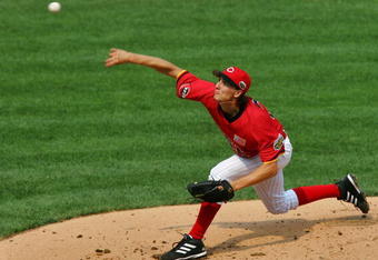 PITTSBURGH - JULY 09:  Pitcher Homer Bailey #22 of the U.S.A. Team pitches against the World Team during the XM Satellite Radio All-Star Futures Game at PNC Park on July 9, 2006 in Pittsburgh, Pennsylvania.  (Photo by Jim McIsaac/Getty Images)