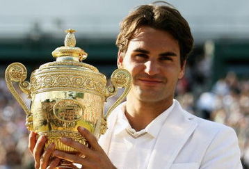 LONDON - JULY 08:  Roger Federer of Switzerland poses with the trophy as he celebrates victory following the Men's Singles final match against Rafael Nadal of Spain during day thirteen of the Wimbledon Lawn Tennis Championships at the All England Lawn Tennis and Croquet Club on July 8, 2007 in London, England. Roger Federer claims his fifth consecutive championship title.  (Photo by Clive Brunskill/Getty Images)